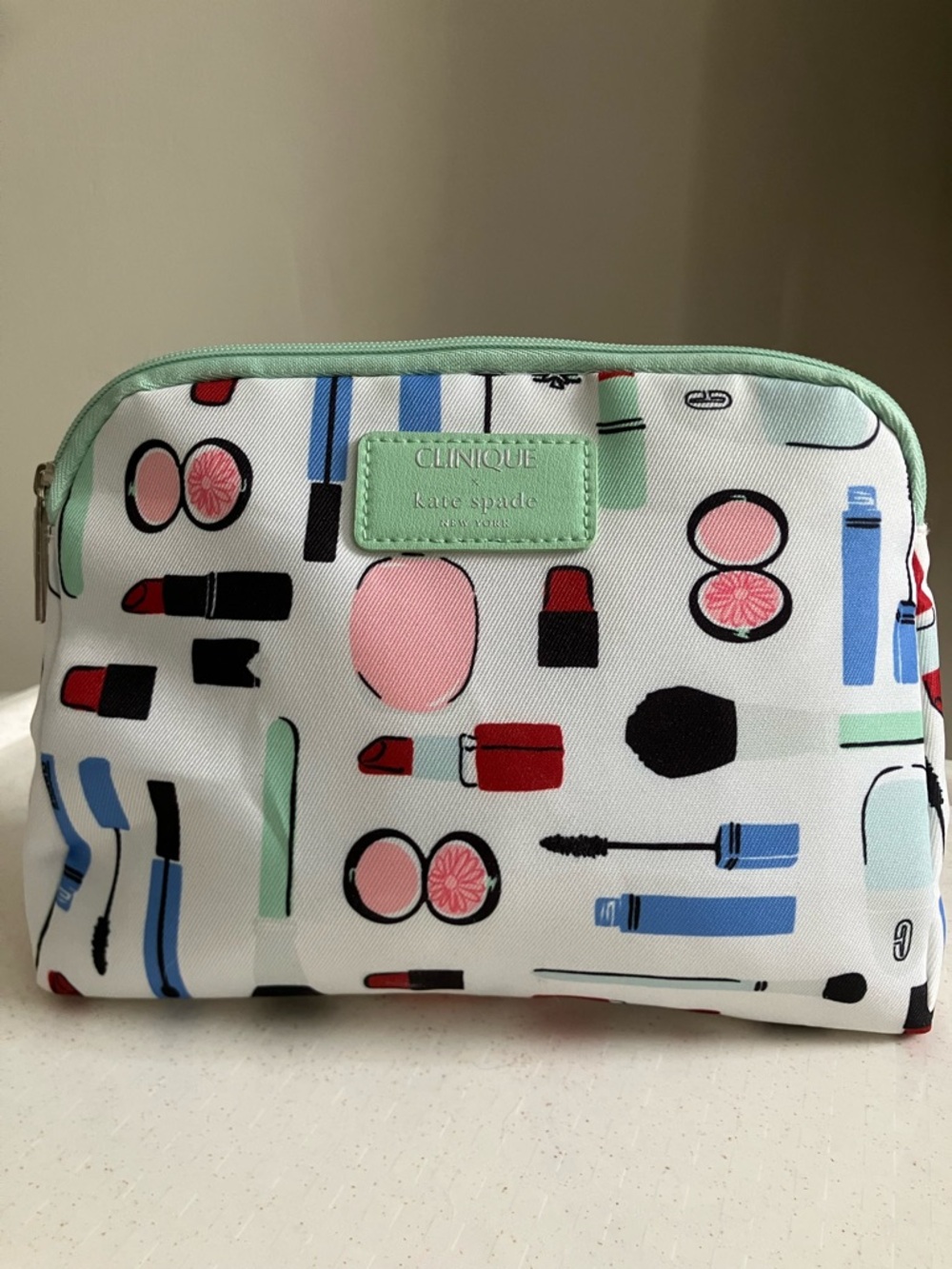 Kate Spade x Clinique Cosmetic Pouch in Mint, Pink, Blue and Red